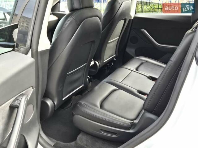 Белый Тесла Model Y, объемом двигателя 0 л и пробегом 70 тыс. км за 31500 $, фото 11 на Automoto.ua