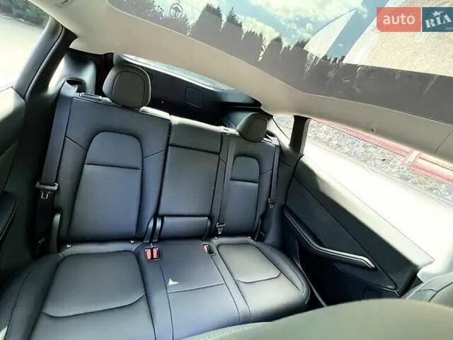 Белый Тесла Model Y, объемом двигателя 0 л и пробегом 68 тыс. км за 31599 $, фото 24 на Automoto.ua