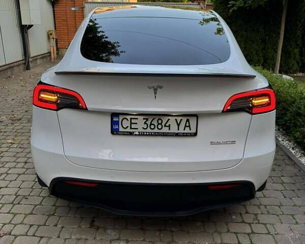 Белый Тесла Model Y, объемом двигателя 0 л и пробегом 97 тыс. км за 26500 $, фото 1 на Automoto.ua