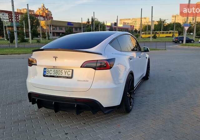 Белый Тесла Model Y, объемом двигателя 0 л и пробегом 85 тыс. км за 33000 $, фото 2 на Automoto.ua