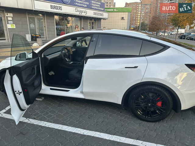 Белый Тесла Model Y, объемом двигателя 0 л и пробегом 80 тыс. км за 31500 $, фото 20 на Automoto.ua