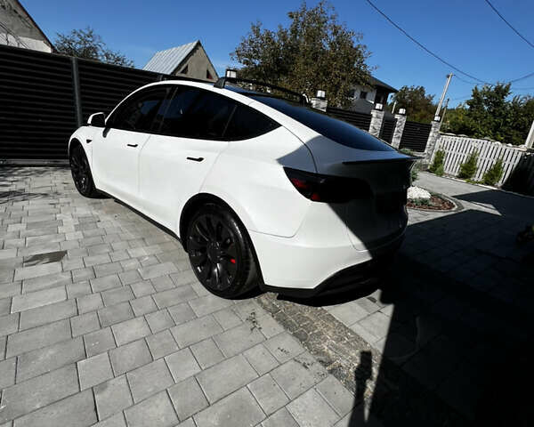 Белый Тесла Model Y, объемом двигателя 0 л и пробегом 59 тыс. км за 26999 $, фото 2 на Automoto.ua