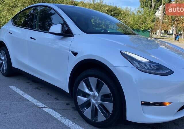 Білий Тесла Model Y, об'ємом двигуна 0 л та пробігом 100 тис. км за 25400 $, фото 11 на Automoto.ua