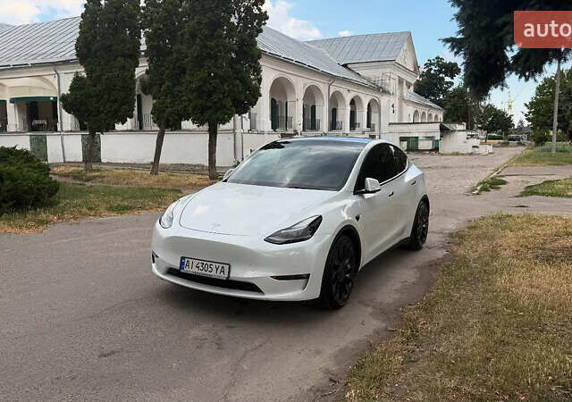 Білий Тесла Model Y, об'ємом двигуна 0 л та пробігом 80 тис. км за 33000 $, фото 2 на Automoto.ua