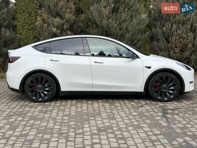 Белый Тесла Model Y, объемом двигателя 0 л и пробегом 129 тыс. км за 27400 $, фото 10 на Automoto.ua