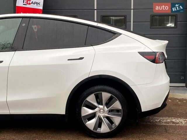 Білий Тесла Model Y, об'ємом двигуна 0 л та пробігом 81 тис. км за 32500 $, фото 6 на Automoto.ua