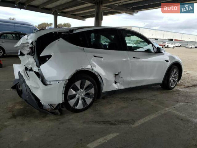 Белый Тесла Model Y, объемом двигателя 0 л и пробегом 53 тыс. км за 17700 $, фото 2 на Automoto.ua
