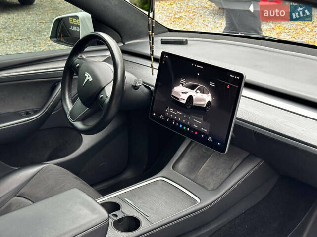 Белый Тесла Model Y, объемом двигателя 0 л и пробегом 57 тыс. км за 32000 $, фото 19 на Automoto.ua