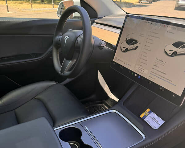 Белый Тесла Model Y, объемом двигателя 0 л и пробегом 45 тыс. км за 28900 $, фото 23 на Automoto.ua