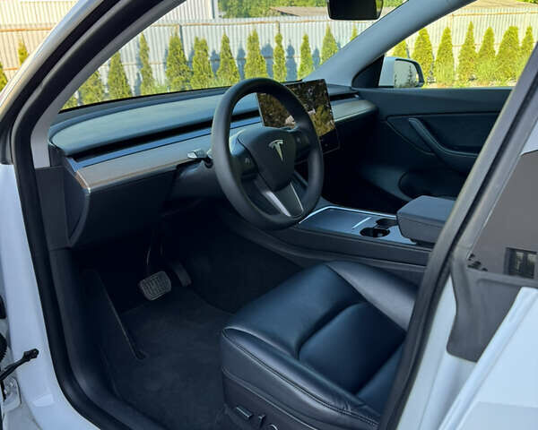Білий Тесла Model Y, об'ємом двигуна 0 л та пробігом 79 тис. км за 25500 $, фото 14 на Automoto.ua