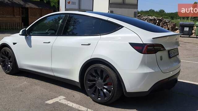 Белый Тесла Model Y, объемом двигателя 0 л и пробегом 62 тыс. км за 30700 $, фото 7 на Automoto.ua