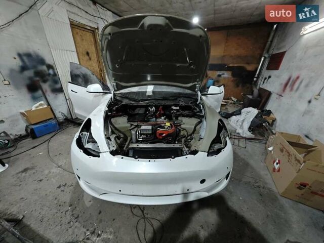 Белый Тесла Model Y, объемом двигателя 0 л и пробегом 38 тыс. км за 28000 $, фото 61 на Automoto.ua