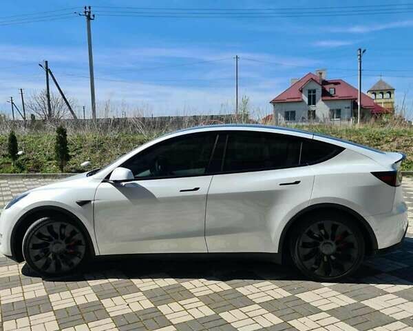 Белый Тесла Model Y, объемом двигателя 0 л и пробегом 54 тыс. км за 28000 $, фото 3 на Automoto.ua