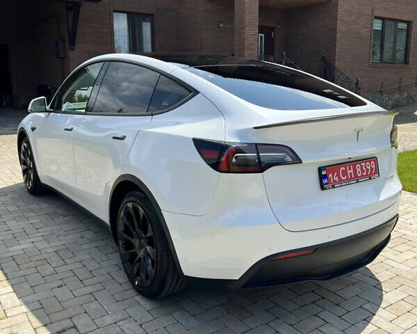 Білий Тесла Model Y, об'ємом двигуна 0 л та пробігом 43 тис. км за 28500 $, фото 4 на Automoto.ua