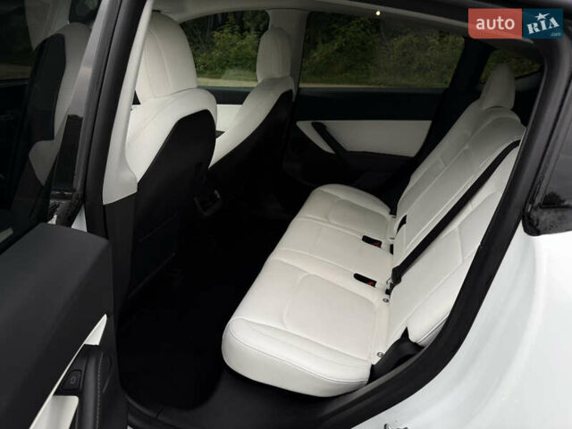 Тесла Model Y 2022 у Городке на Automoto.ua Білий Тесла Model Y, об'ємом двигуна 0 л та пробігом 102 тис. км за 28200 $, фото 11 на Automoto.ua