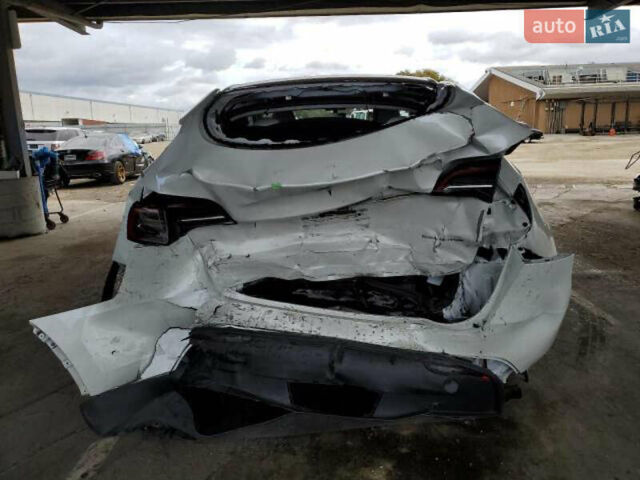 Белый Тесла Model Y, объемом двигателя 0 л и пробегом 53 тыс. км за 17700 $, фото 5 на Automoto.ua