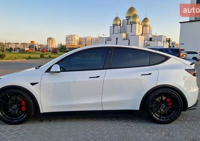 Белый Тесла Model Y, объемом двигателя 0 л и пробегом 85 тыс. км за 33000 $, фото 6 на Automoto.ua