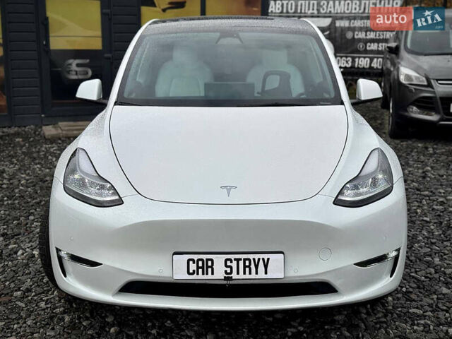 Білий Тесла Model Y, об'ємом двигуна 0 л та пробігом 62 тис. км за 27400 $, фото 6 на Automoto.ua