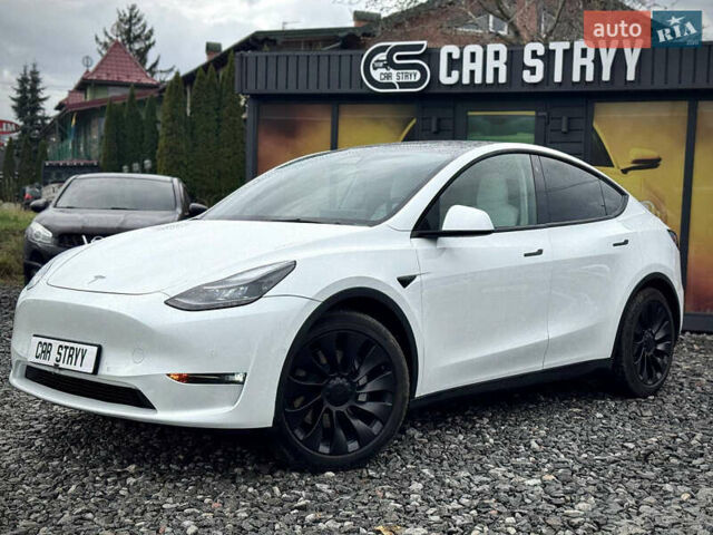 Білий Тесла Model Y, об'ємом двигуна 0 л та пробігом 62 тис. км за 27400 $, фото 3 на Automoto.ua