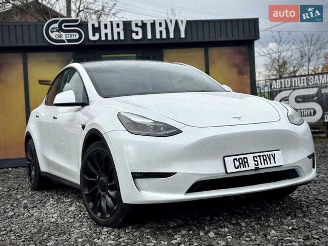 Білий Тесла Model Y, об'ємом двигуна 0 л та пробігом 62 тис. км за 27400 $, фото 10 на Automoto.ua