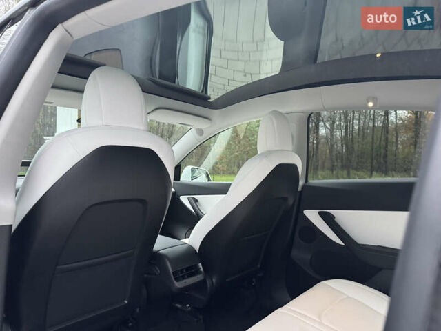Білий Тесла Model Y, об'ємом двигуна 0 л та пробігом 115 тис. км за 25800 $, фото 29 на Automoto.ua