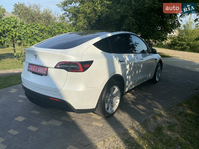 Белый Тесла Model Y, объемом двигателя 0 л и пробегом 58 тыс. км за 24000 $, фото 67 на Automoto.ua