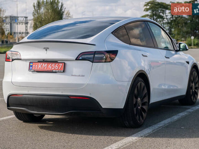 Белый Тесла Model Y, объемом двигателя 0 л и пробегом 51 тыс. км за 29500 $, фото 7 на Automoto.ua