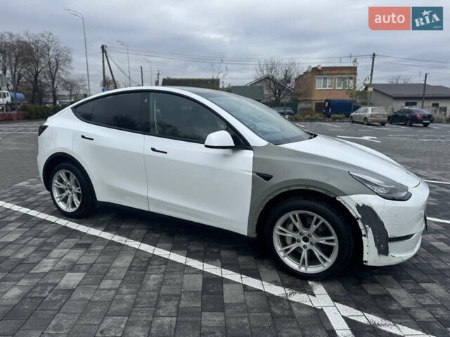 Білий Тесла Model Y, об'ємом двигуна 0 л та пробігом 100 тис. км за 23999 $, фото 11 на Automoto.ua