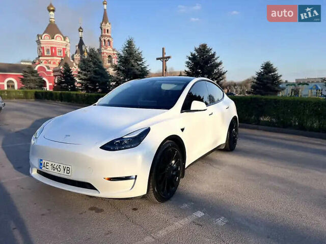 Белый Тесла Model Y, объемом двигателя 0 л и пробегом 62 тыс. км за 28000 $, фото 1 на Automoto.ua