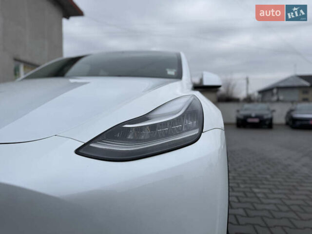 Білий Тесла Model Y, об'ємом двигуна 0 л та пробігом 37 тис. км за 25500 $, фото 10 на Automoto.ua