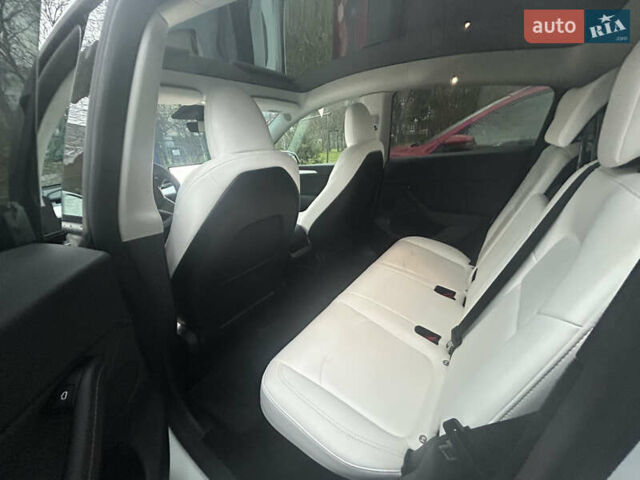 Білий Тесла Model Y, об'ємом двигуна 0 л та пробігом 84 тис. км за 28300 $, фото 12 на Automoto.ua