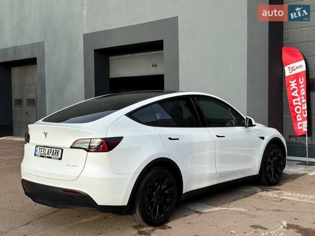 Белый Тесла Model Y, объемом двигателя 0 л и пробегом 89 тыс. км за 30999 $, фото 9 на Automoto.ua