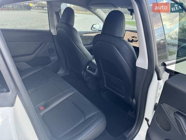 Белый Тесла Model Y, объемом двигателя 0 л и пробегом 58 тыс. км за 32490 $, фото 13 на Automoto.ua