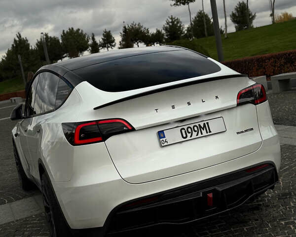 Білий Тесла Model Y, об'ємом двигуна 0 л та пробігом 52 тис. км за 32000 $, фото 11 на Automoto.ua