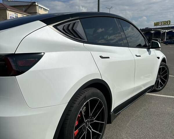 Білий Тесла Model Y, об'ємом двигуна 0 л та пробігом 75 тис. км за 33500 $, фото 5 на Automoto.ua