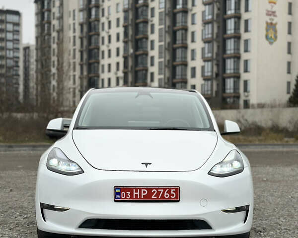 Білий Тесла Model Y, об'ємом двигуна 0 л та пробігом 76 тис. км за 29000 $, фото 1 на Automoto.ua