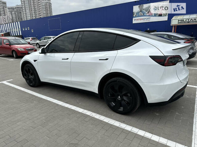 Белый Тесла Model Y, объемом двигателя 0 л и пробегом 13 тыс. км за 42777 $, фото 21 на Automoto.ua