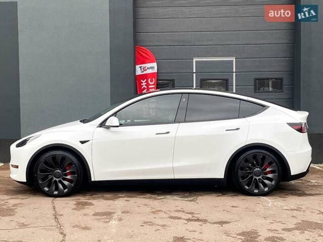 Белый Тесла Model Y, объемом двигателя 0 л и пробегом 49 тыс. км за 34999 $, фото 5 на Automoto.ua