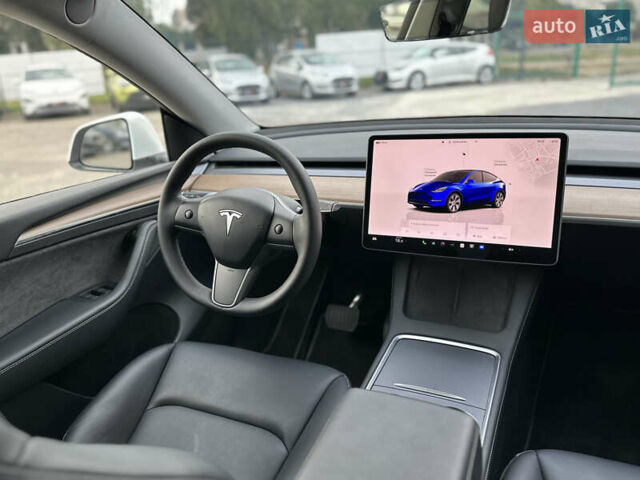 Білий Тесла Model Y, об'ємом двигуна 0 л та пробігом 47 тис. км за 26500 $, фото 37 на Automoto.ua