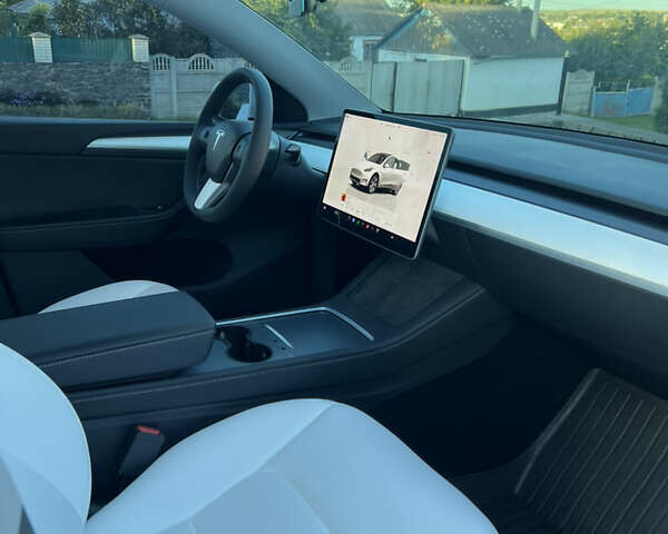 Білий Тесла Model Y, об'ємом двигуна 0 л та пробігом 81 тис. км за 31900 $, фото 30 на Automoto.ua