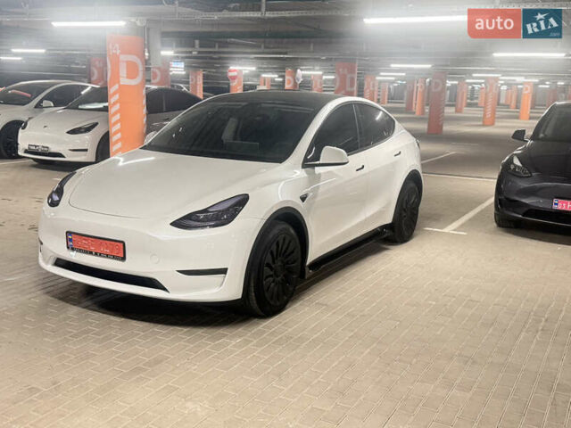 Белый Тесла Model Y, объемом двигателя 0 л и пробегом 87 тыс. км за 28999 $, фото 2 на Automoto.ua