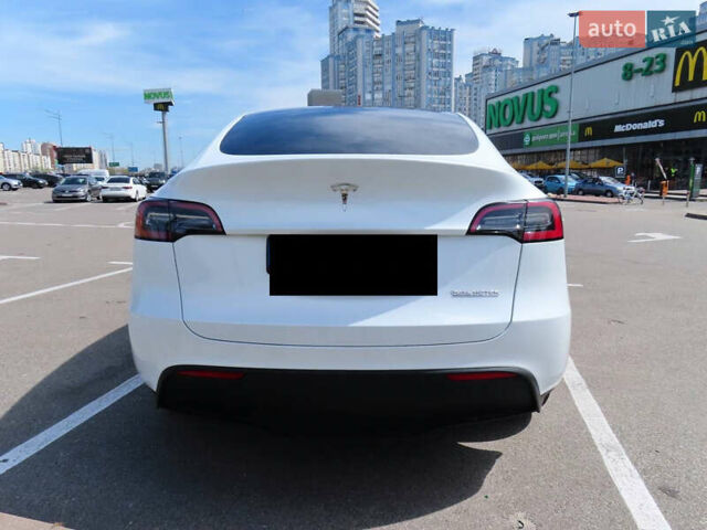 Белый Тесла Model Y, объемом двигателя 0 л и пробегом 41 тыс. км за 27000 $, фото 2 на Automoto.ua