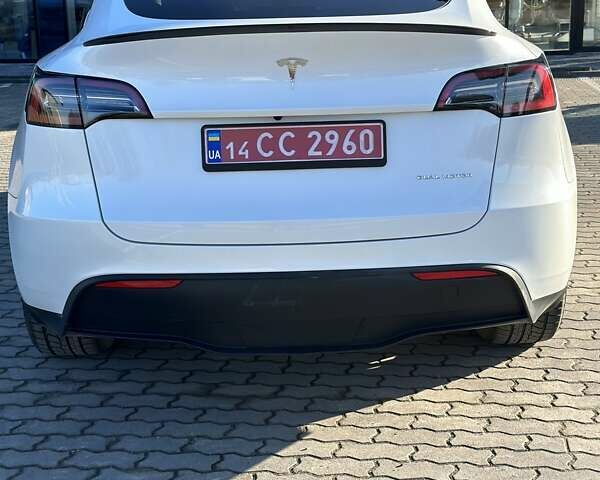 Белый Тесла Model Y, объемом двигателя 0 л и пробегом 70 тыс. км за 26900 $, фото 4 на Automoto.ua