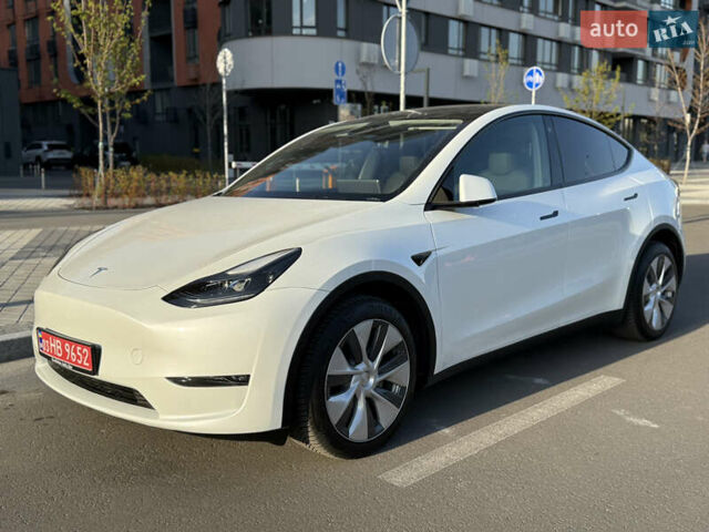 Білий Тесла Model Y, об'ємом двигуна 0 л та пробігом 55 тис. км за 33014 $, фото 1 на Automoto.ua