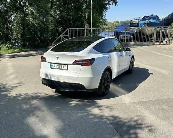 Белый Тесла Model Y, объемом двигателя 0 л и пробегом 8 тыс. км за 34999 $, фото 5 на Automoto.ua