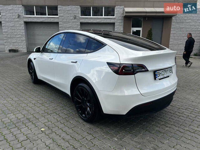 Белый Тесла Model Y, объемом двигателя 0 л и пробегом 98 тыс. км за 28000 $, фото 5 на Automoto.ua