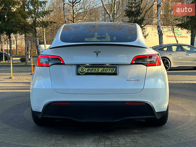 Білий Тесла Model Y, об'ємом двигуна 0 л та пробігом 73 тис. км за 27750 $, фото 5 на Automoto.ua