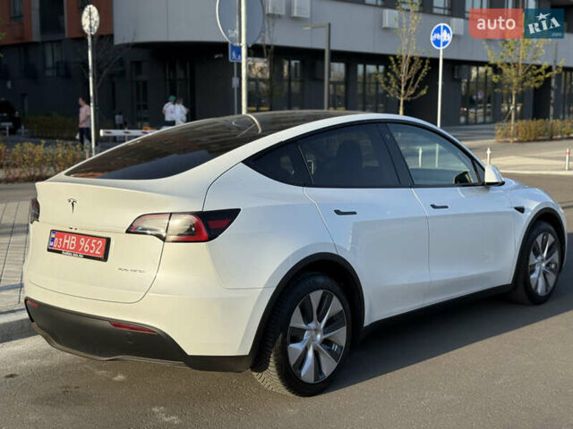 Білий Тесла Model Y, об'ємом двигуна 0 л та пробігом 55 тис. км за 33014 $, фото 12 на Automoto.ua