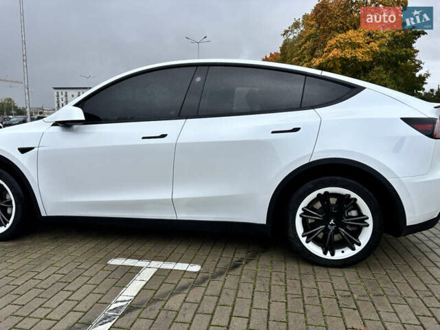 Білий Тесла Model Y, об'ємом двигуна 0 л та пробігом 45 тис. км за 27500 $, фото 26 на Automoto.ua