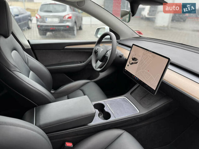 Білий Тесла Model Y, об'ємом двигуна 0 л та пробігом 37 тис. км за 25500 $, фото 31 на Automoto.ua